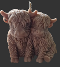 Snuggling Highland cow  candle