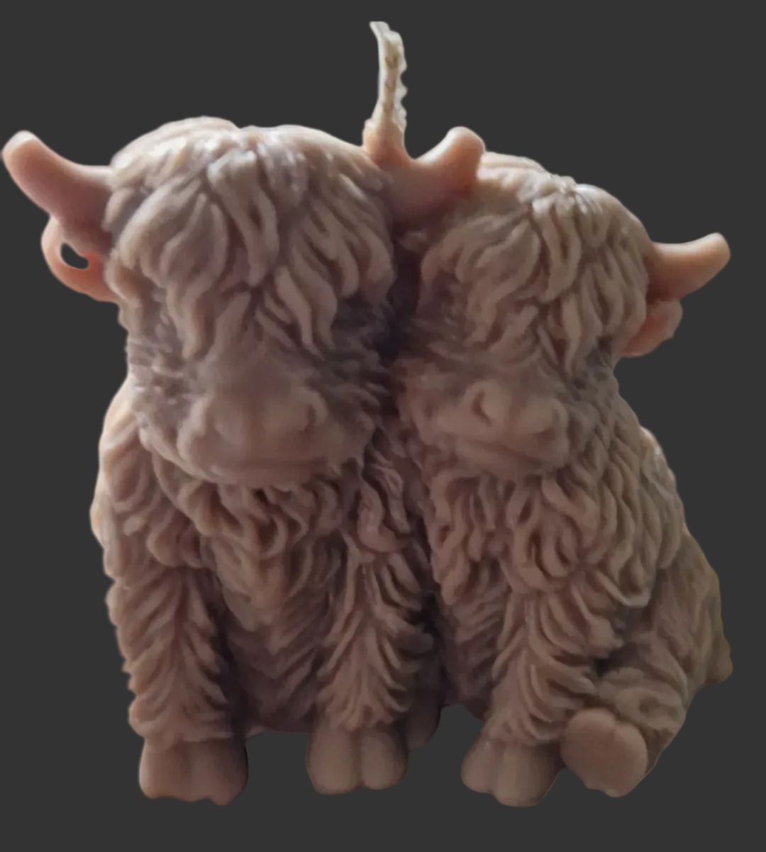 Snuggling Highland cow  candle
